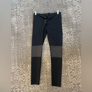 Cute leggings with adorable features on the knee and front ties